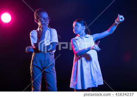 Happy girl looking at her friend 41634237