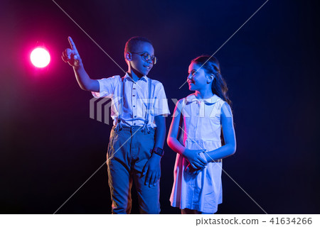 Happy boy talking with a lovely girl 41634266