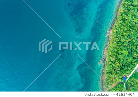 Exotic idyllic sea island with green tree forest Exotic idyllic sea island with green tree forest 41634404