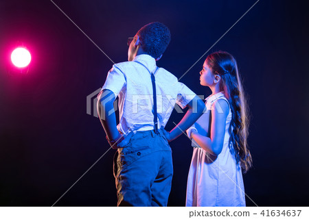 Meditative kids looking in the distance 41634637