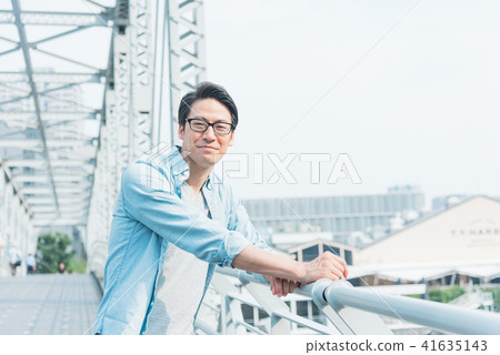 Young man portrait city 41635143