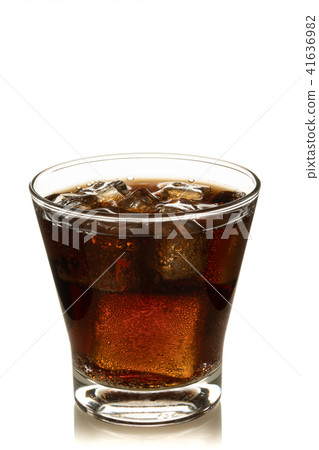 Cola in glass with ice on white background Cola in glass with ice on white background 41636982