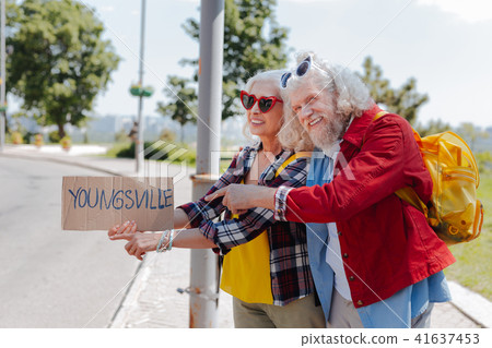 Joyful nice couple travelling Joyful nice couple travelling 41637453
