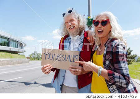 Joyful delighted couple going to youngsville Joyful delighted couple going to youngsville 41637459