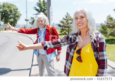 Delighted aged woman smiling Delighted aged woman smiling 41637571