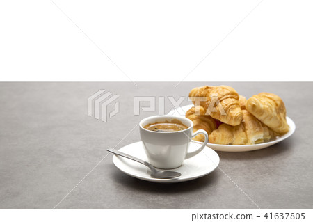 Cup of fresh coffee with croissants Cup of fresh coffee with croissants 41637805