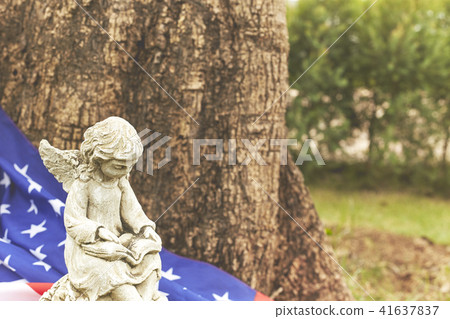 girl angel statue with the flag of america girl angel statue with the flag of america 41637837