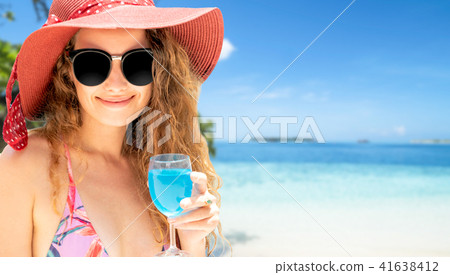 Happy young woman at beach in summer vacation. Happy young woman at beach in summer vacation. 41638412