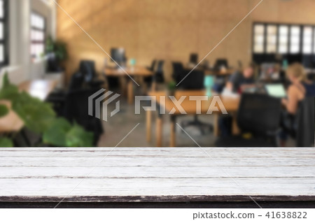 Selected focus empty brown wooden table in office with big windo Selected focus empty brown wooden table in office with big windo 41638822