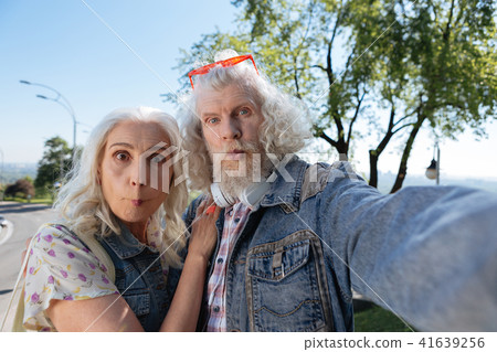 Positive aged people grimacing Positive aged people grimacing 41639256