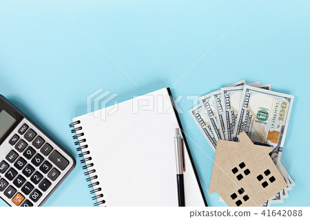 House, Dollar, notebook and calculator on table House, Dollar, notebook and calculator on table 41642088
