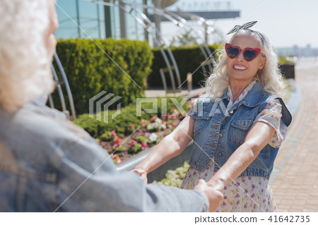 Cheerful pleasant woman feeling happy Cheerful pleasant woman feeling happy 41642735