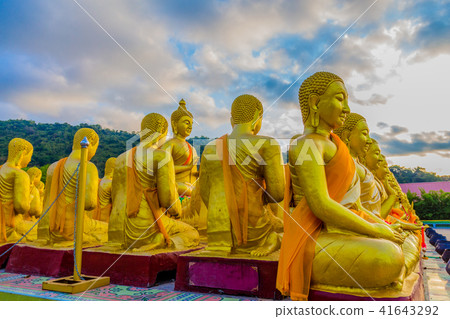 big Buddha statue sitting in small buddha statues big Buddha statue sitting in small buddha statues 41643292