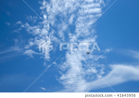 Blue sky and early summer clouds and airplanes Blue sky and early summer clouds and airplanes 41643956