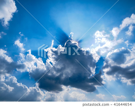 Sunbeam through the haze on blue sky 41644654