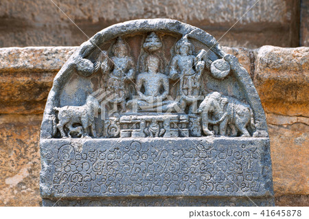 Carved inscriptions in Kannada on the stone pillar Carved inscriptions in Kannada on the stone pillar 41645878