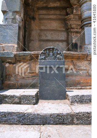 Carved inscriptions in Kannada on the stone pillar 41645880