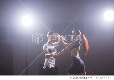 Young couple dancing latin dance Bachata, merengue, salsa. Two elegance pose in dance class 41646458