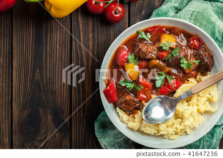 Hungarian beef goulash serwed with galuska noodles Hungarian beef goulash serwed with galuska noodles 41647236