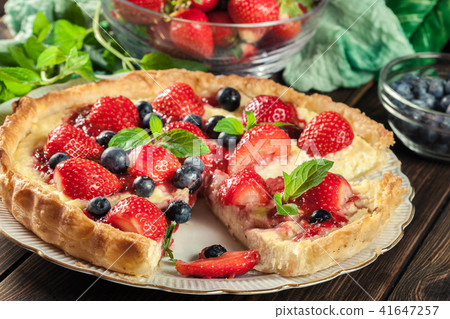 Tart with cheese, strawberries and blueberries Tart with cheese, strawberries and blueberries 41647257