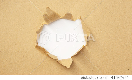 Brown paper was ripped at the center. Brown paper was ripped at the center. 41647695