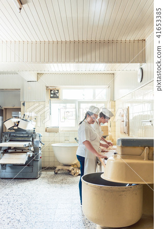 Wide view of bread production in bakery 41653385