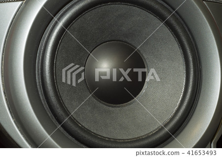 Detail shot of some old round speakers. 41653493