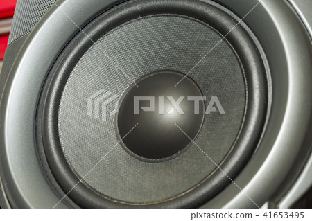 Detail shot of some old round speakers. 41653495