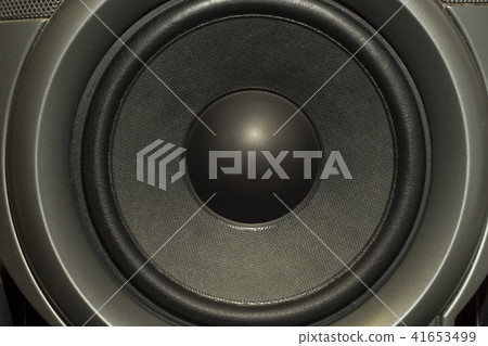 Detail shot of some old round speakers. 41653499