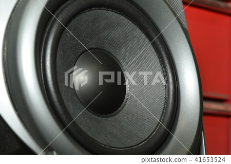 Detail shot of some old round speakers. 41653524