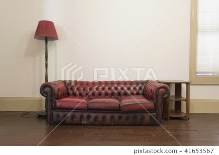 Red sofa and lamp 41653567