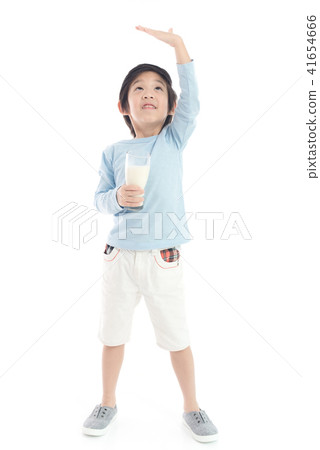 child drinking milk from a glass child drinking milk from a glass 41654666