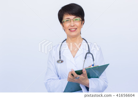 Medical physician doctor woman over white background Medical physician doctor woman over white background 41656604
