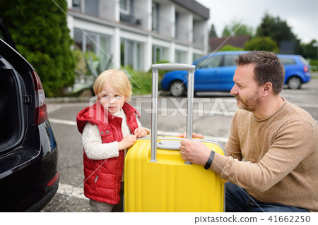 man and his little son going to vacations man and his little son going to vacations 41662250