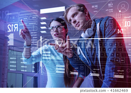 Emotional woman frowning and looking worried while dealing with a problem 41662469