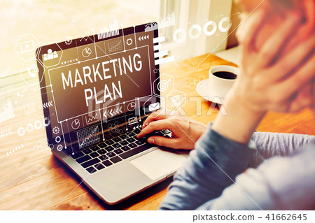 Marketing plan with man using a laptop Marketing plan with man using a laptop 41662645