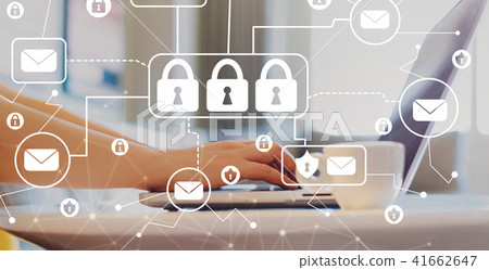 Email security theme with woman using a laptop 41662647