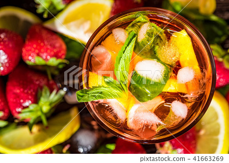 Homemade srawberry mojito and berries on wood 41663269