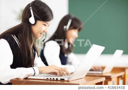 teenager student learning online with headphones  41663438