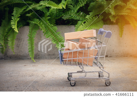 Shopping concept, Mini trolley and wooden block Shopping concept, Mini trolley and wooden block 41666111
