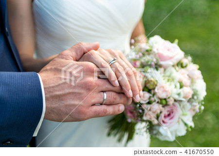 hands groom and bride with wedding rings celebration love symbol hands groom and bride with wedding rings celebration love symbol 41670550