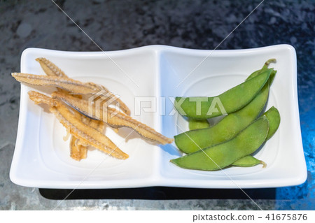 deep fried fish bone senbei and edamame beans deep fried fish bone senbei and edamame beans 41675876