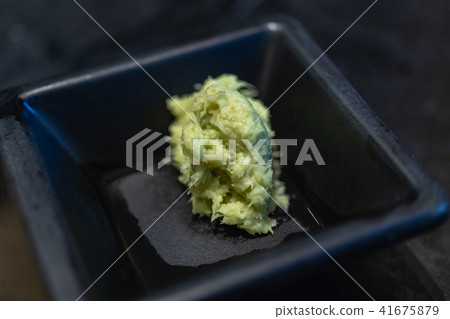fresh wasabi on black plate fresh wasabi on black plate 41675879