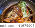 salmon fish head soup with soy sauce 41675905