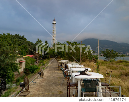 cat on outdoor dining table cat on outdoor dining table 41676374
