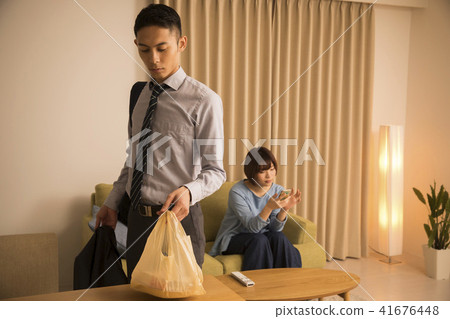 A wife ignoring a late return home husband A wife ignoring a late return home husband 41676448