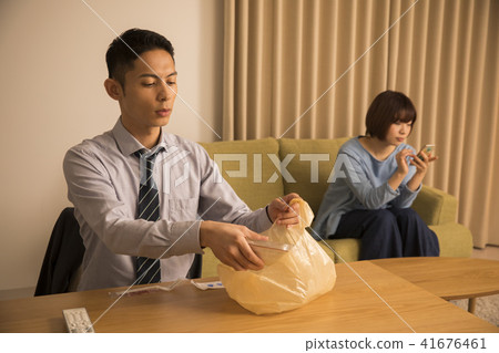 A wife ignoring a late return home husband 41676461