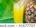 Tall Glass Freshly Squeezed Tropical Fruit Juice 41677707