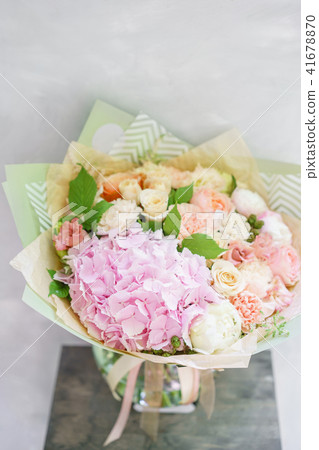 beautiful spring bouquet. flower arrangement with hydrangea and peonies. Color light pink. The 41678870