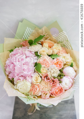 beautiful spring bouquet. flower arrangement with hydrangea and peonies. Color light pink. The beautiful spring bouquet. flower arrangement with hydrangea and peonies. Color light pink. The 41678889